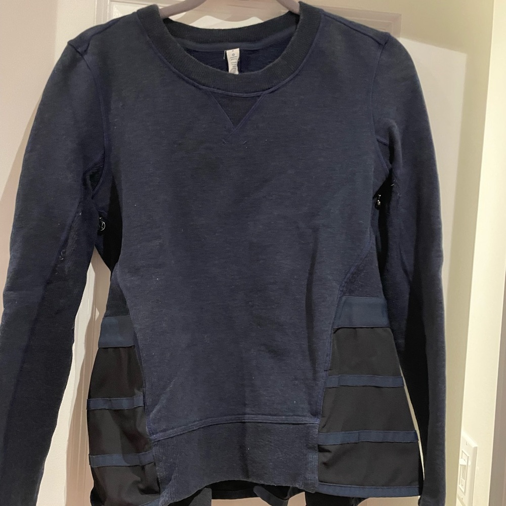 Cute lululemon pullover with detailed back. Excellent condition
